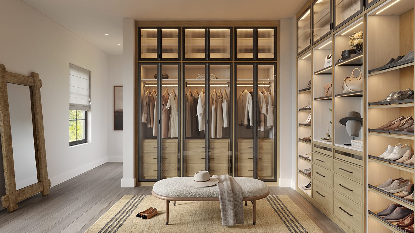 Floor to ceiling storage design with custom shelves and led lighting by California Closets