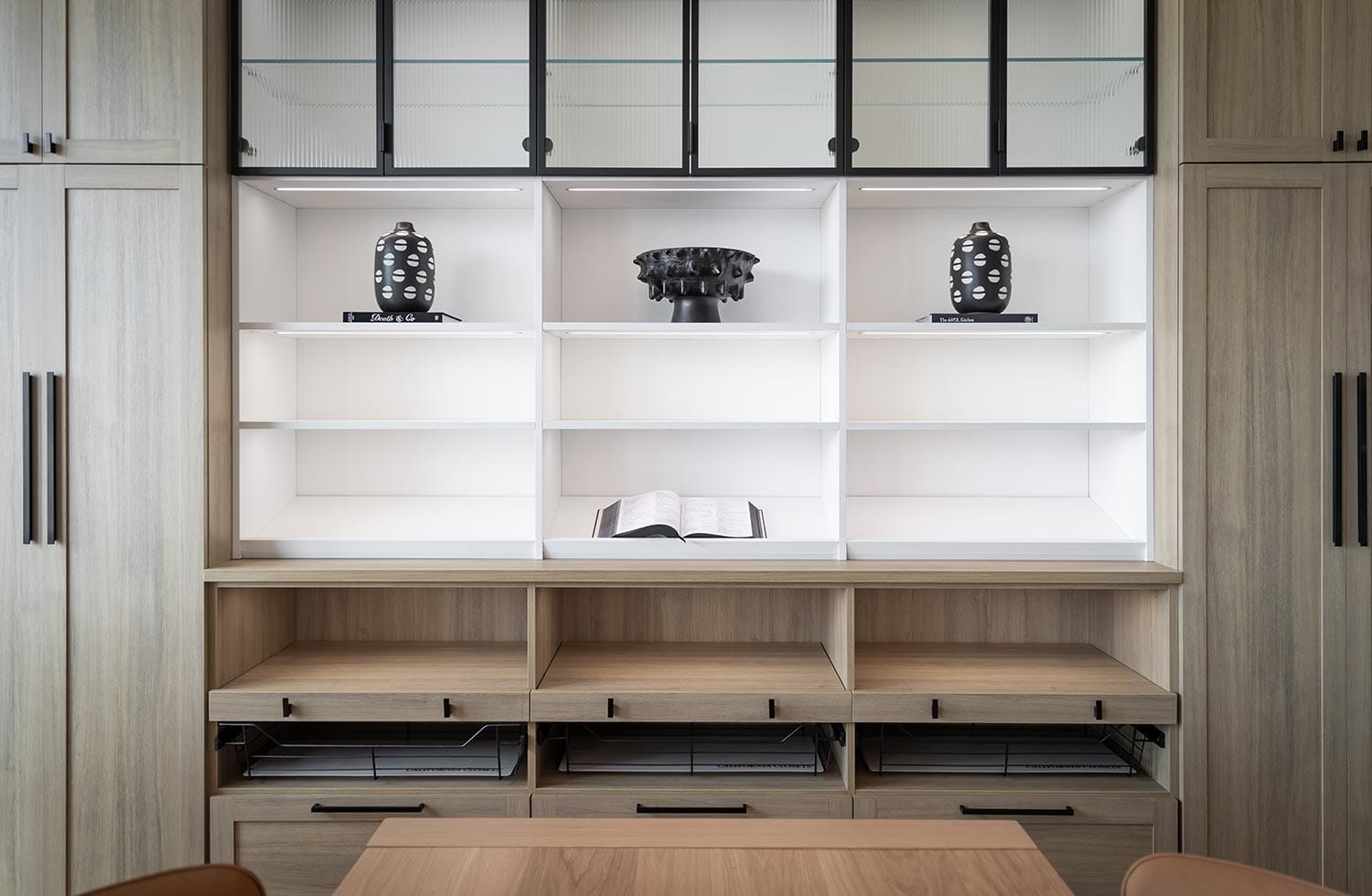 Open shelving design with custom drawers for kitchen pantry by California Closets