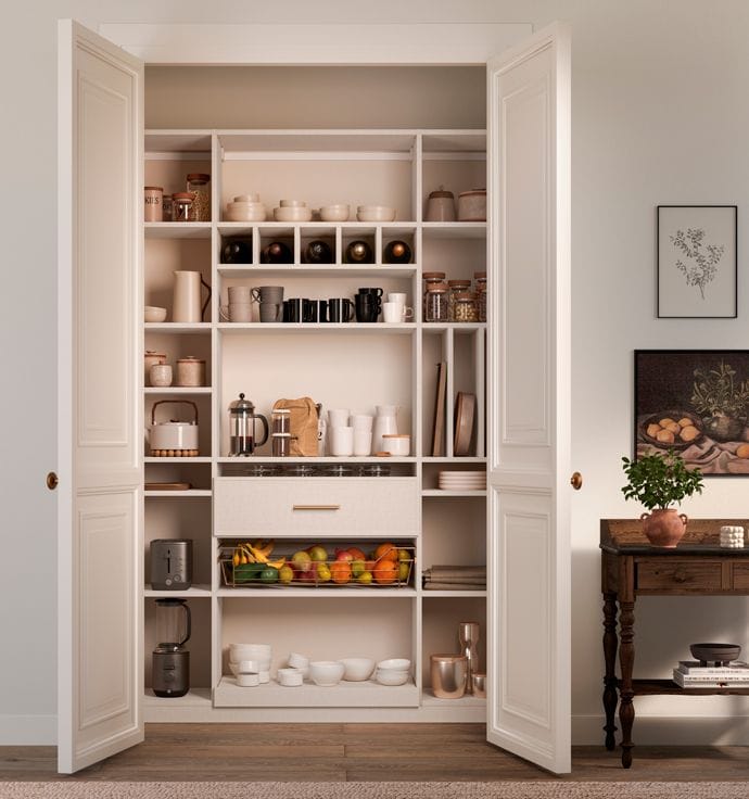 Reach in kitchen pantry storage with custom shelves, cubbies in white wood grain finish by California Closets